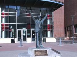Statue of American Hockey Legend Herb Brooks outside of the River Centre in St Paul, Minnesota Stock Footage