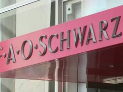 CU, FAO Schwarz sign above store entrance, Fifth Avenue, New York City, New York, USA Stock Footage