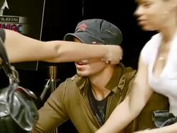 Enrique Iglesias Promotes Release of 'Insomniac' with Performance and Signing Stock Footage