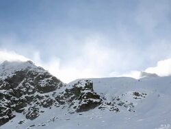 Time lapse view of high winds drifting snow, mountains Stock Footage