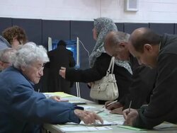 November 2, 2010 MS Voters receiving ballots for the midterm election / Dearborn, Michigan, United States Stock Footage