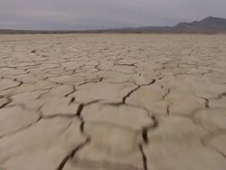  WS POV Landscape with cracks on arid desert / Mojave, California, USA Stock Footage