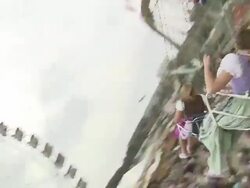 girls ride a carousel, from the rear Stock Footage