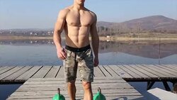 Doing exercise with kettle Stock Footage