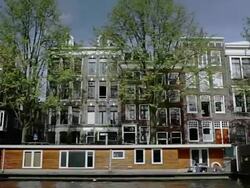 MS POV View along central canals from moving boat / Amsterdam, Netherlands Stock Footage