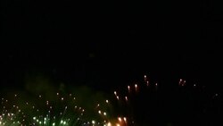 Fireworks sparkle in a night time celebration. Stock Footage