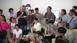 News conf by surrogate mother of Down's Syndrome baby rejected by parents News Clip