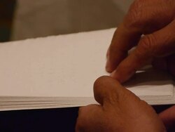 Reading braille letter Stock Footage