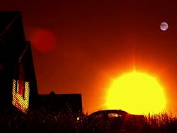 Sunrise Time Lapse Composited With Full Moon Over A House Stock Footage