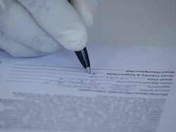 Writing on agree form Stock Footage