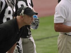 CU, PAN, Disappointed American football coach and players on sidelines, Staten Island, New York, USA Stock Footage
