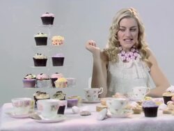 Young woman choosing a cake Stock Footage