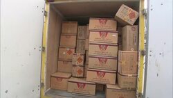 He Wei employees open a truck full of boxes of fireworks ready to be unloaded in Beijing. Stock Footage