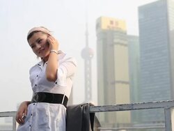 Business man standing on moving ship Stock Footage