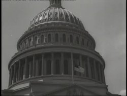 The American flag flies at half-mast in front of the U.S. Capitol Building upon the death of U.S. President Franklin D. Roosevelt. News Clip