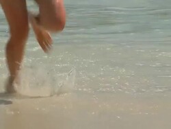HD SLOW-MOTION: Running In The Ocean Stock Footage