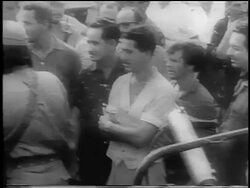 B/W 1959 high angle PAN crowd of guerrilla soldiers / Cuba / newsreel Stock Footage