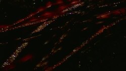 Birds eye view of a multi-leveled stack interchange at night. Stock Footage