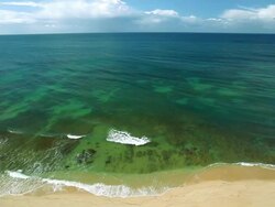 Seascape view of colorful ocean and beach in Algarve, Portugal, Europe Stock Footage