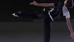 SLO MO TU Male figure skater performing parallel spin variation Stock Footage