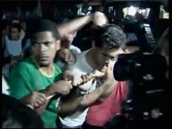 President campaigns in the streets of Rio, meets local artists News Clip