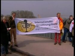 Protesters gather and practice for NATO's 60th anniversary summit News Clip