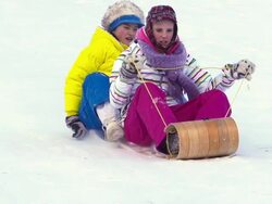 Young girls Tobogganing in Super Slow motion Stock Footage