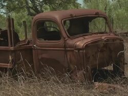 Military truck rusts in outback, Kimberley, Australia Stock Footage