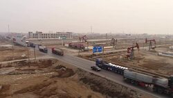 Aerial View of Oil Field, Oil Tank Truck and Air Pollution In China Stock Footage