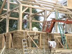 WS ZO Carpenters at working while framing an energy efficient post / Grass Lake, Michigan, USA         Stock Footage
