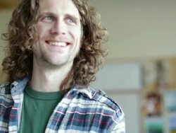 Male student painting in art class Stock Footage