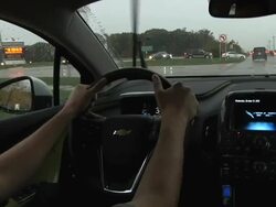 MS POV Driver behind wheel of electric car / Rochester, Michigan, United States Stock Footage