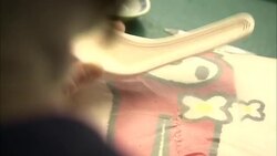 An artisan paints a porcelain spoon in Arita, Japan. Stock Footage