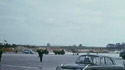 1969 MONTAGE Cars being driven onto the cargo hold of the Ramsgate hovercraft for the Channel crossing / Kent, England Stock Footage