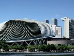 The Esplanade and Marina Bay Buildings pan to the Singapore Flyer Ferris wheel, Singapore Stock Footage