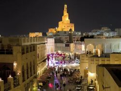 WS POV T/L  View of restored Souq Waqif  and traditional dance performing by dancers  / Doha, Qatar Stock Footage
