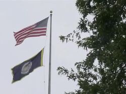 MS American flag and Great Seal of the United States flag on pole / Washington D.C., USA Stock Footage