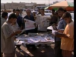 Iraqis comment on US govt reward for capture of Saddam Hussein News Clip
