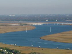 WS AERIAL View of lake with bridge and wooded area / South Carolina, United States Stock Footage
