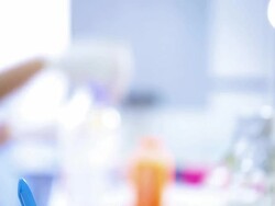 Scientist writing notebook in laboratory Stock Footage