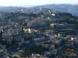 MS Shot of arab villages in east Jerusalem and occupied territories devided by Israeli West Bank barrier / Jerusalem, Judea, Israel Stock Footage