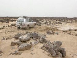 Car riding through rocky landscape Stock Footage