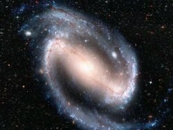 Astrophysics.  Animation of a Cepheid variable star varying in brightness in the arm of a spiral galaxy. Stock Footage