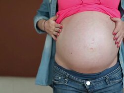 Pregnant young woman Stock Footage