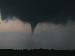 WS View of developing tornado at dusk reaches down to touch ground / Thornberry, Texas, United States Stock Footage