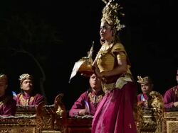 MS Balinese girl dancer are performing Tari Penyambutan Dance ( Goddess of Moon ) in front of Gamelan Orchestra in Puri Saraswati temple AUDIO / Ubud, Bali, Indonesia, Asia Stock Footage