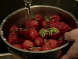 CU TS Baker rinsing strawberries / Copenhagen, Seeland, Denmark    Stock Footage