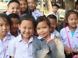 MS SLO MO POV Children standing laughing at schoolyard / Vientiane, Laos Stock Footage