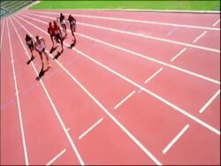 MS T/L relay athletes passing on baton, top view, Australia Stock Footage