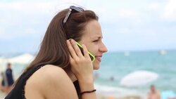 Beautiful young woman taking a photo herself Stock Footage